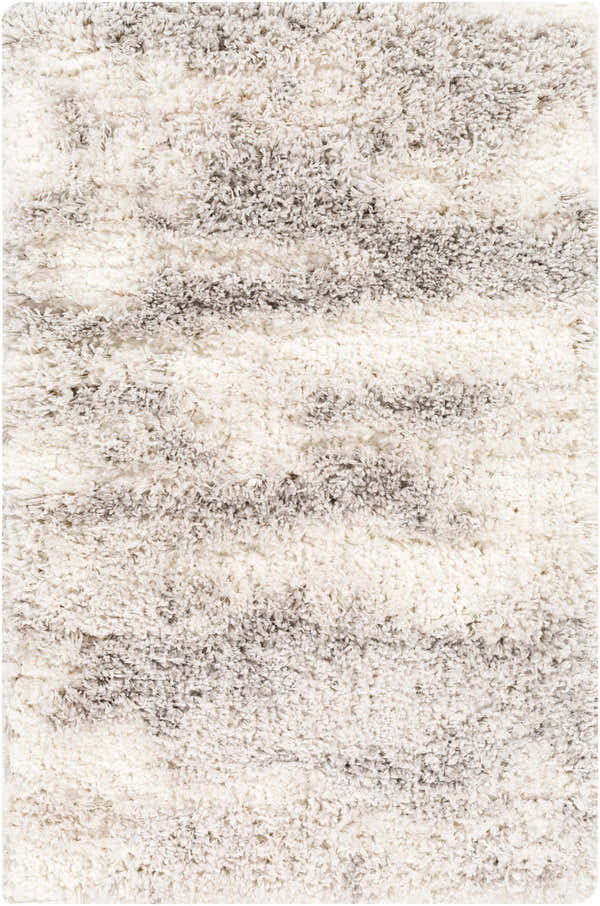 Close-up of the Dagami Area Rug. Shag rug with a horizontal striped pattern in gray, light gray, and white. Soft texture. Design-Rectangle-23