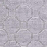 Close-up of the gray Damascus Area Rug, featuring a geometric pattern of octagons and squares. Texture