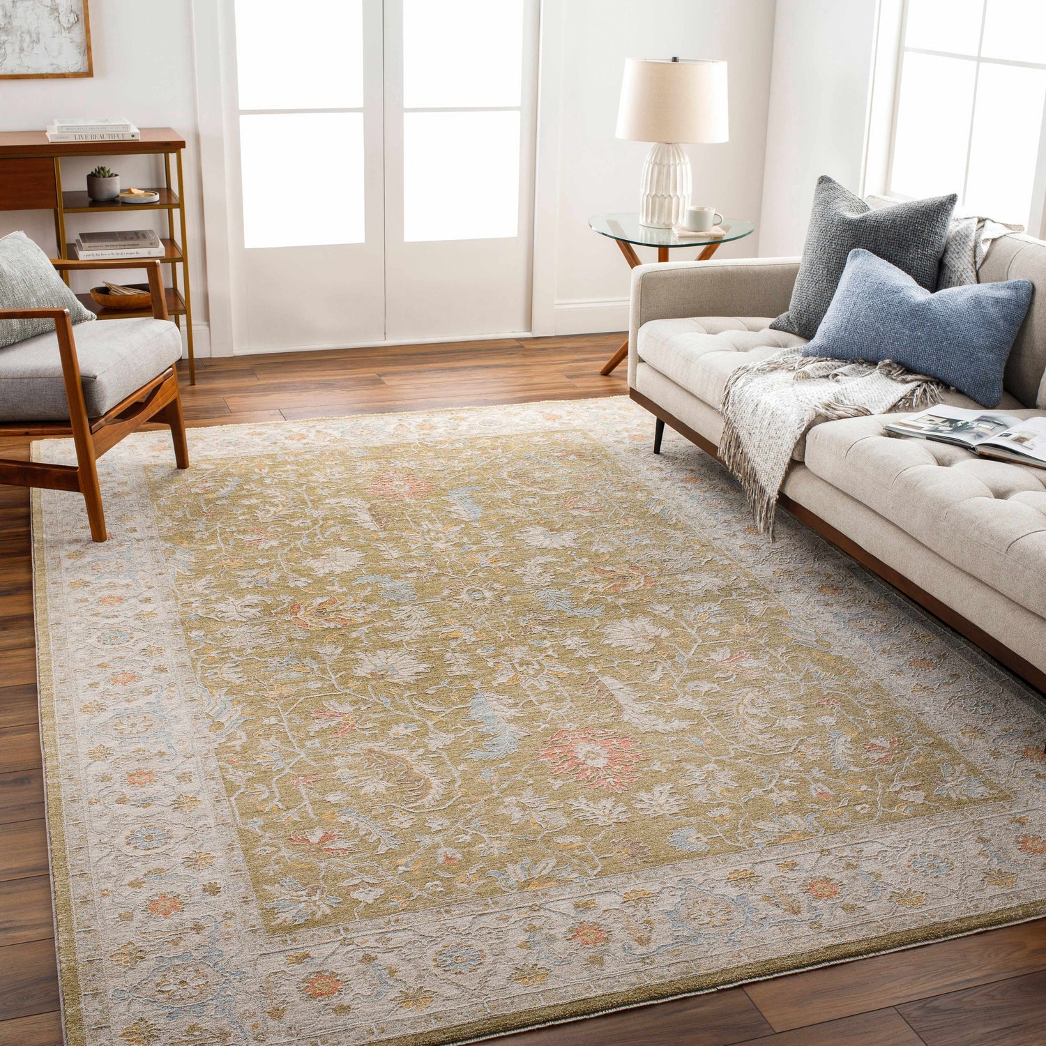 Living room with a Dario Thick Luxe Area Rug in amber, olive, and pink floral pattern. Farmhouse style. Roomscene-Rectangle