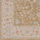 Close-up of the Dario Thick Luxe Area Rug, featuring a traditional floral pattern in amber, olive, and dusty pink hues. Swatch