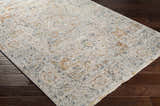 Close-up of the Darvel Luxe Rug showing its brick red, cream, and gray Persian-inspired pattern and soft texture. Corner