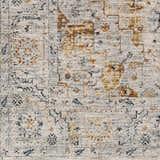 Close up of the Darvel Luxe Rug. Traditional Persian-style rug in cream, gray, brick red, and mustard. Swatch