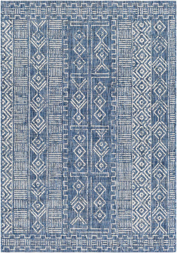 Close-up of the Deeth Area Rug. Bohemian style rug in blue and white with geometric patterns. Design-Rectangle-5376