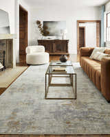 Living room scene with brown sofa and Deka Deep Teal Thick Luxe Rug. Roomscene-Rectangle