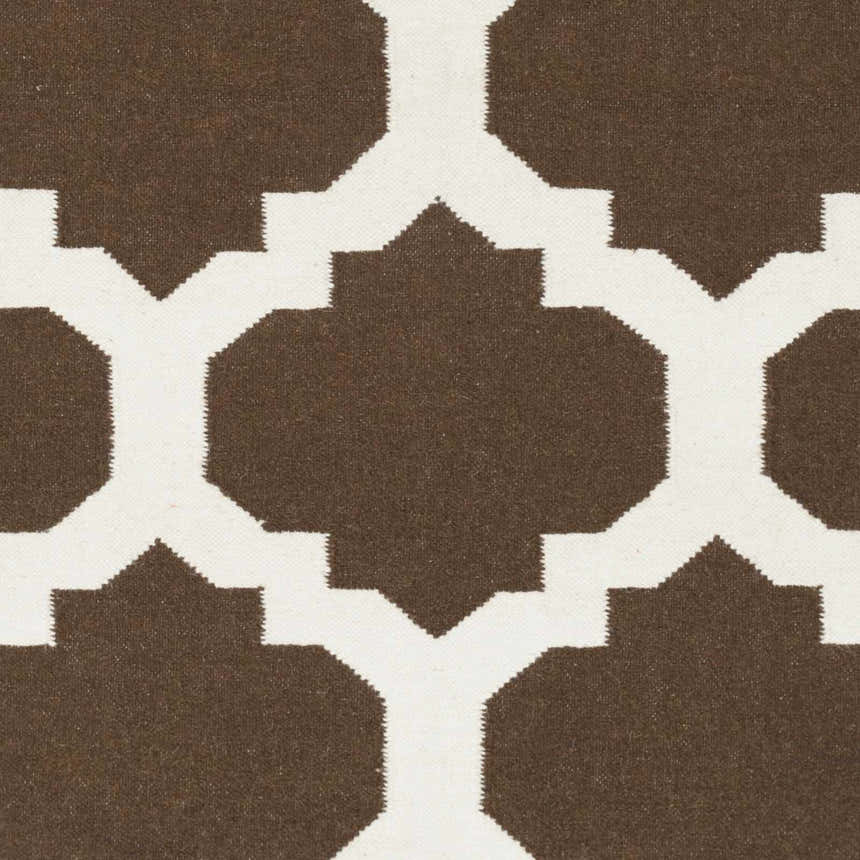Close up of the Depew Area Rug, a hand woven wool rug with a dark brown and ivory geometric pattern. Swatch