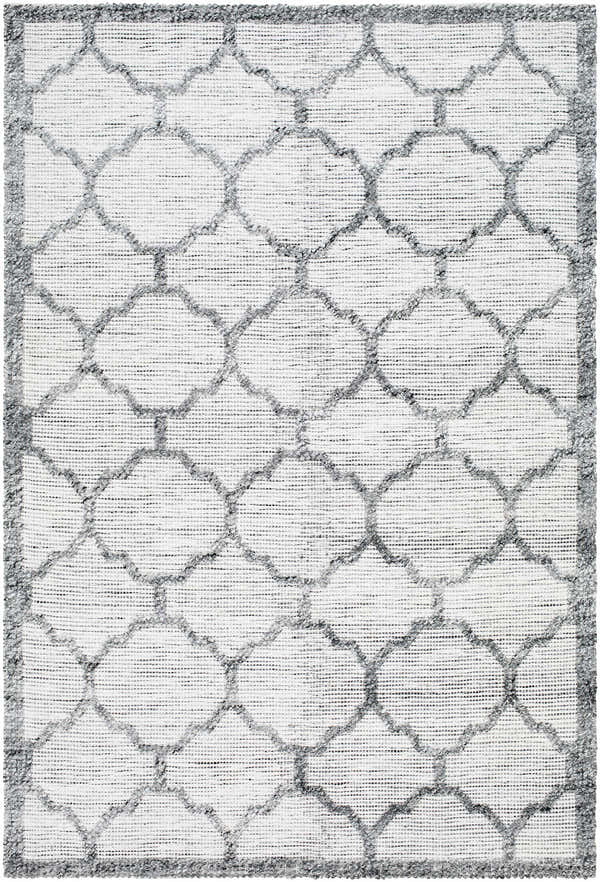Close-up of the hand woven Dido Area Rug in charcoal and gray with a traditional quatrefoil pattern. Design-Rectangle-576