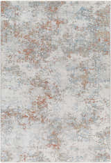 Close-up of the Dinos Thick Luxe Rug. Contemporary design with gray, blue, and nutmeg abstract pattern. Design-Rectangle-575
