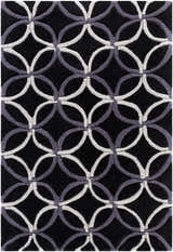 Close-up of the Delano Area Rug. Black rug with light gray and charcoal interlocking circle pattern. Hand-tufted polyester texture. Design-Rectangle-23