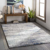 Entryway scene with a Jeju Thick Abstract Area Rug in aqua, gray, and blue on dark wood floors. Roomscene-Rectangle