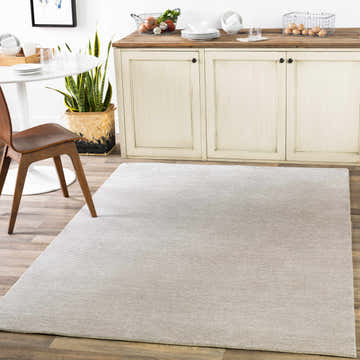 Farmhouse kitchen with light gray Donegal Carpet, white cabinets, wood floors, and round table. Roomscene-Rectangle