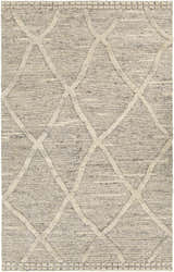 Close-up of the Donsol Area Carpet. Hand-woven wool rug in gray and cream with a geometric diamond pattern. Bohemian style. Design-Rectangle-576