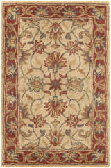 Close-up of the Cherryfield Hand Tufted Brown & Rust 1001 Wool Rug. Features a traditional floral pattern and brick red border. Design-Rectangle-23