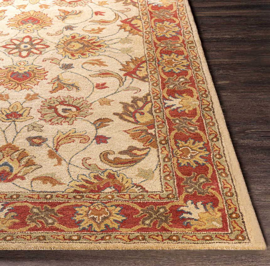 Close-up of the hand-tufted Cherryfield Brown & Rust 1001 Wool Rug. Features a traditional floral pattern with brick red and tan colors. Front