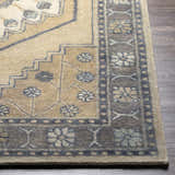 Close up of the Duckenfield Area Rug, a hand-tufted wool rug with a beige and gray floral and geometric design. Front