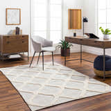 Bright home office with Dusan Area Rug in arctic stone and cloud gray, wood desk, gray chair, and wood floors. Roomscene-Rectangle