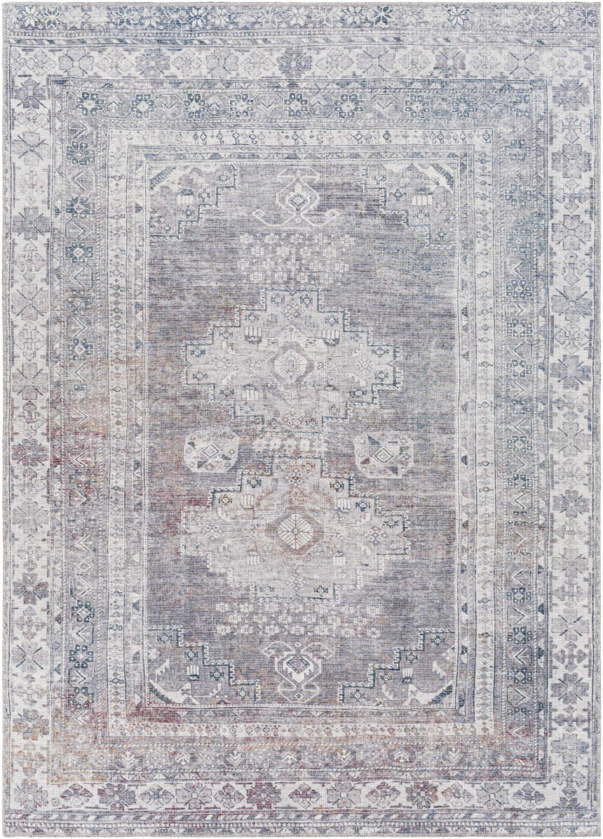 Close-up of the Baltinglass Gray Washable Rug featuring a traditional oriental pattern in brown, charcoal, cream, and gray tones. Design-Rectangle-5373