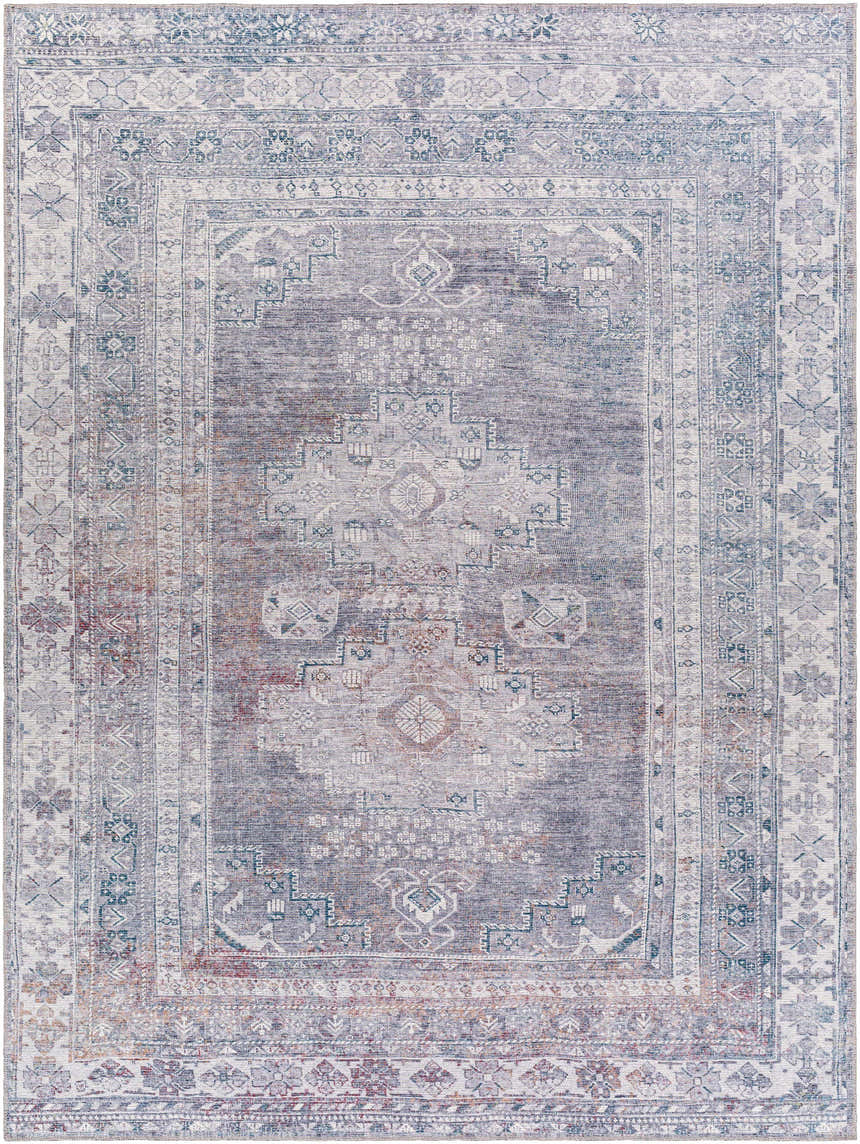 Close-up of the Baltinglass Gray Washable Rug, featuring a traditional oriental pattern in brown, charcoal, cream, and gray. Design-Rectangle-710102