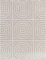 Close-up of the Edmund Area Carpet, a hand-woven wool rug with a gray geometric octagon pattern. Design-Rectangle-810