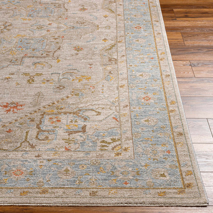 Close-up of the Ehan Cream Thick Luxe Oushak Rug showing the traditional pattern, amber, and blue tones. Front