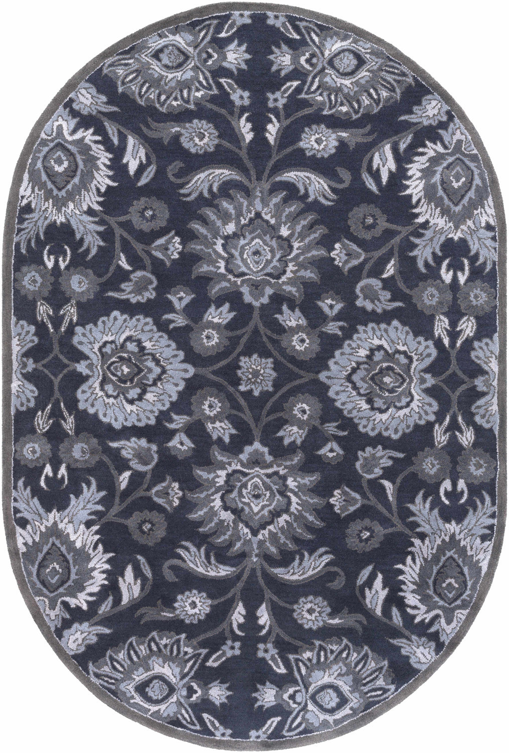 Close-up of the oval Conesus Hand Tufted Blue Area Rug. Features a traditional floral pattern in charcoal, denim, and slate blue. Design-Oval-69