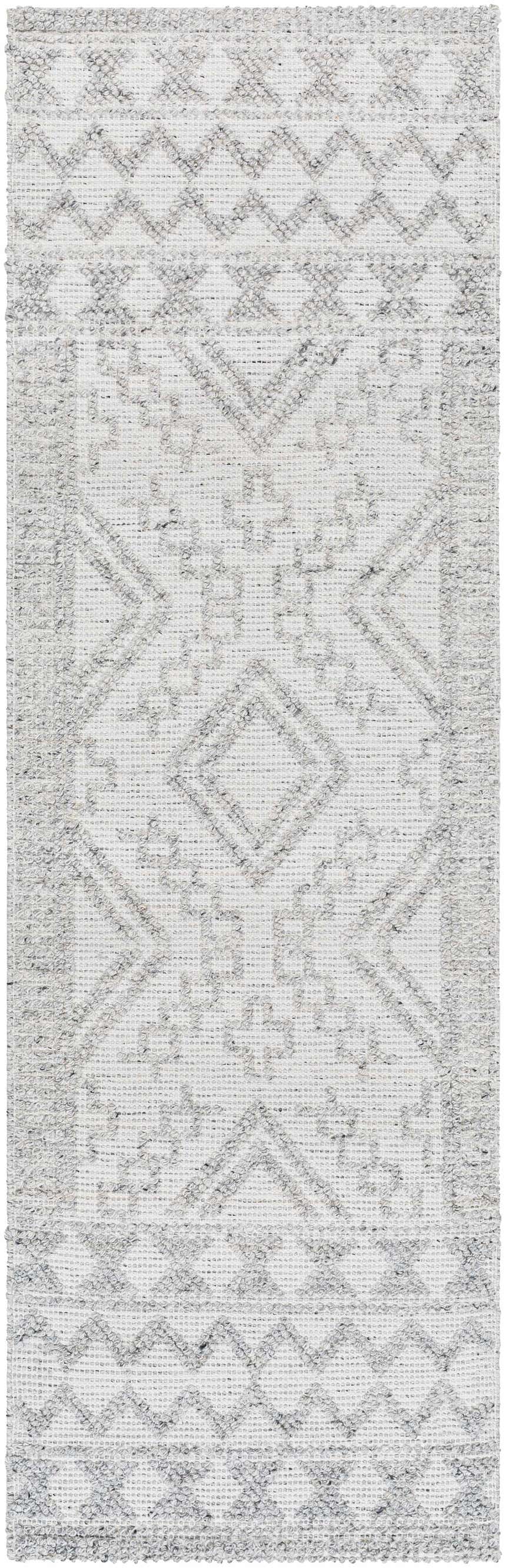Close-up of the hand woven Elin Area Rug. Arctic Stone, dark gray, and nickel geometric pattern. Farmhouse style. Design-Runner-268