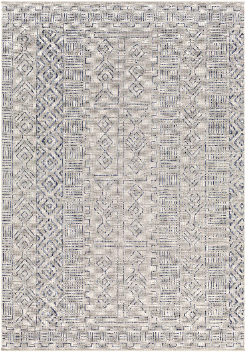 Close-up of the Epson Indoor Outdoor Rug. Bohemian style with a geometric blue pattern on an oatmeal background. Design-Rectangle-5377
