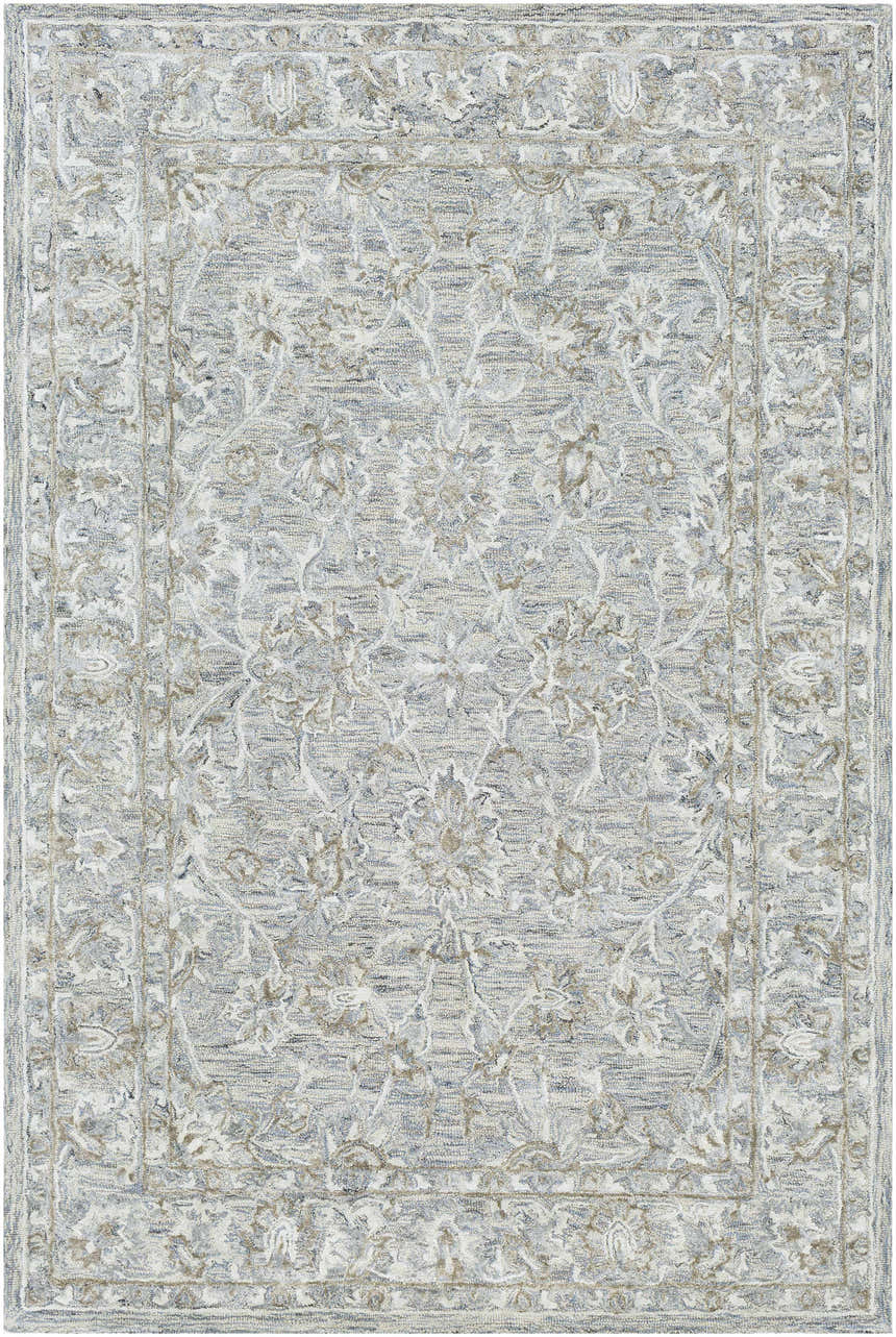 Close-up of the Eriline Wool & Faux Silk Rug. Features denim, ivory, sage, and taupe floral pattern. Hand-tufted texture. Design-Rectangle-576