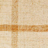 Close-up of the Errin Jute Area Rug showing beige and camel geometric pattern and hand-woven jute texture. Swatch
