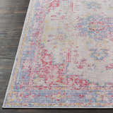 Close-up of the Eufaula Area Rug showing its traditional pattern in burgundy, gray, lavender, red, and yellow. Front