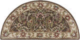 Close-up of a hearth-shaped Eupora Wool Rug. Brown rug with floral pattern in red, green, and cream. Hand-tufted wool texture. Design-Hearth