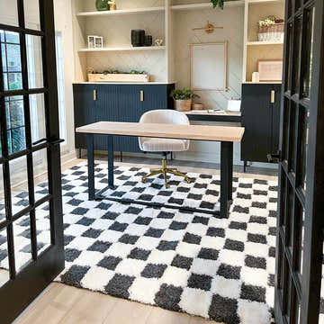 Home office with black desk and Atira Black & White Checkered Area Rug. Modern, stylish workspace. Roomscene-Rectangle