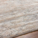 Close-up of the Ferrelview Area Rug showing its ivory, gray, and tan contemporary stripe pattern and soft texture. Texture