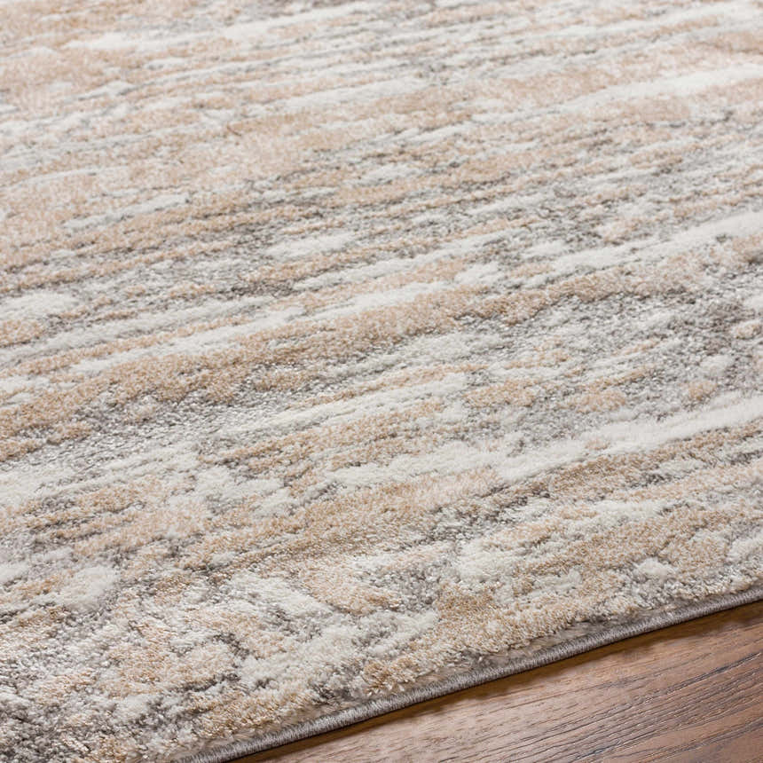 Close-up of the Ferrelview Area Rug showing its ivory, gray, and tan contemporary stripe pattern and soft texture. Texture