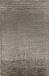 Close-up of the Fochabers Premium Area Rug, hand-loomed with a subtle black and medium gray contemporary design. Cotton and viscose texture. Design-Rectangle-69