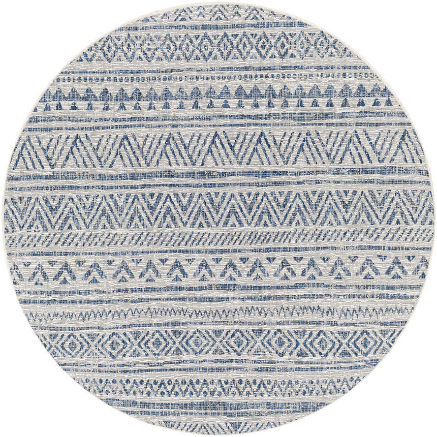 Close-up of round Novato Navy All Over Pattern Performance Rug. Features blue and white bohemian-inspired geometric design. Design-Round-67