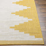 Close-up of the Djugun Yellow Outdoor Rug featuring a geometric pattern in yellow and beige on a textured, machine-woven surface. Front
