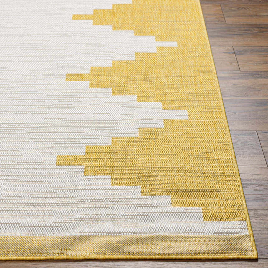 Close-up of the Djugun Yellow Outdoor Rug featuring a geometric pattern in yellow and beige on a textured, machine-woven surface. Front