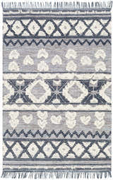 Close-up of Gakona High-Low Cream&Blue Wool Rug. Hand woven rug with bohemian diamond and geometric patterns. Tassels on each end. Design-Rectangle-576