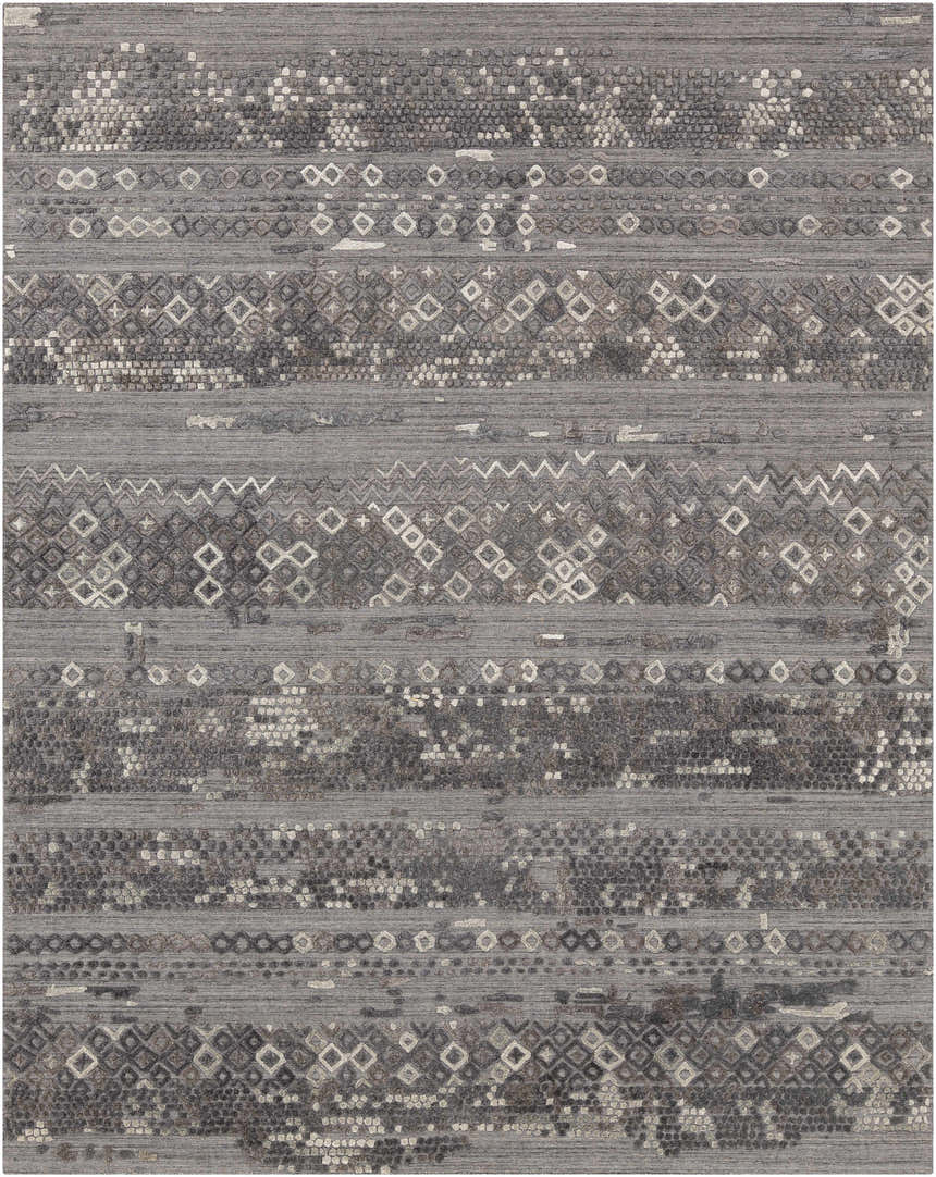 Close-up of Galchutt Embossed Gray Rug. Farmhouse style rug with charcoal, gray, and light gray geometric pattern. Viscose and wool texture. Design-Rectangle-69