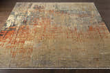Rectangle Geneseo Carpet on dark wood floor. Contemporary style rug in black, burnt orange, charcoal, cream, and tan colors. Front