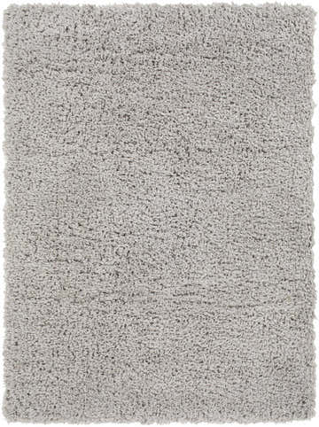 Close-up of the Siari Solid Medium Gray Shag Rug, showing its plush texture and consistent gray color. Design-Rectangle-537