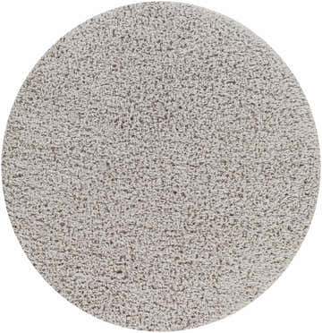Close-up of a round Siari Solid Medium Gray Shag Rug, showing its dense, soft texture and subtle color variations. Design-Round-67