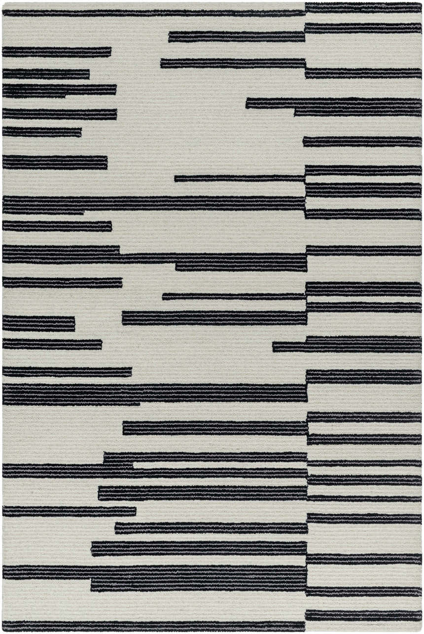 Close-up of the Walid Area Rug. Contemporary style, hand-tufted 100% wool rug in ash and jet black with a geometric stripe pattern. Design-Rectangle-576