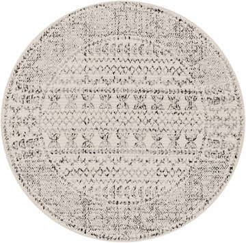 Close-up of a round Greig Area Rug. The rug has a distressed black and gray bohemian pattern on an off-white background. Design-Round-53