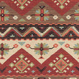 Close-up of the Grimsby Wool Area Rug showing its burgundy, brown, gray, and peach Southwestern-inspired geometric pattern. Swatch