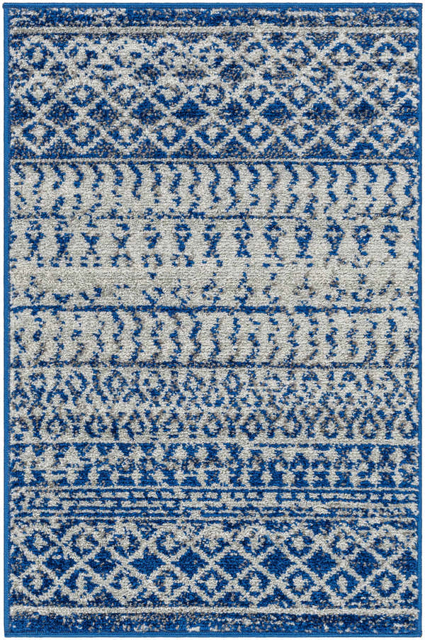 Close-up of the Constantin Blue Area Rug, featuring a blue, gray, and white geometric pattern. Design-Rectangle-23