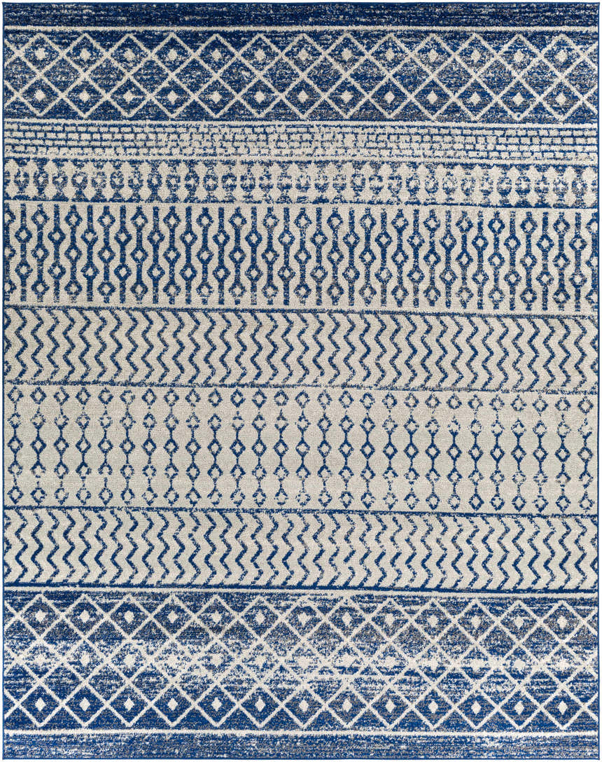 Close-up of the Constantin Blue Area Rug featuring a bohemian-inspired geometric pattern in blue, gray, and white. Design-Rectangle-710103