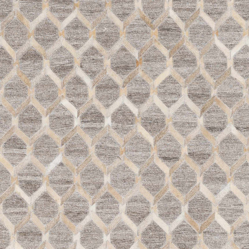 Close-up of the Haddix Premium Leather Rug. Beige, cream, and gray hide forms a geometric trellis pattern. Swatch