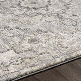 Close-up of the Hagdan Thick Luxe Rug showing cream, gray, and light beige traditional pattern and plush texture. Texture