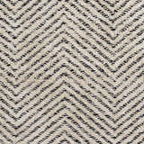 Close-up of the Halton Area Carpet showing a cream and charcoal chevron pattern, hand woven texture. Swatch